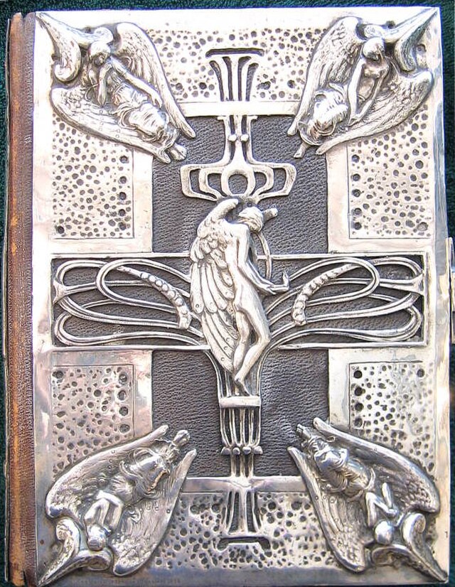 Intricate electroplated book cover, by Lilian Simpson